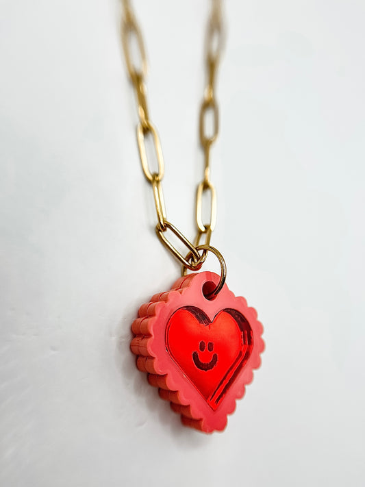 Scalloped Heart Smiley Necklace from Weezy Popshop.