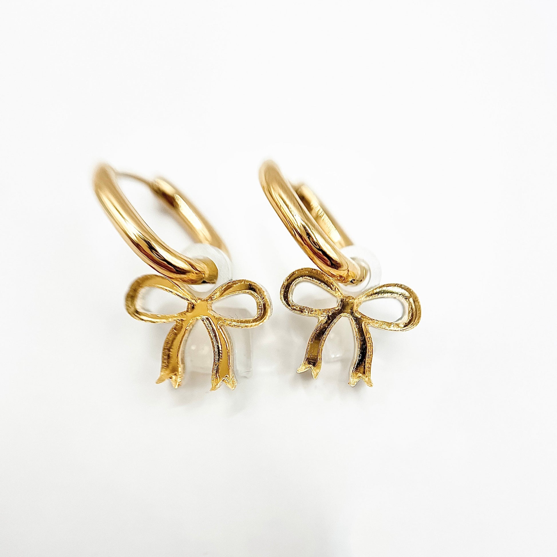 Bow Huggie Earrings – Cute, Trendy and On-Point for Bow Season from Weezy Popshop.