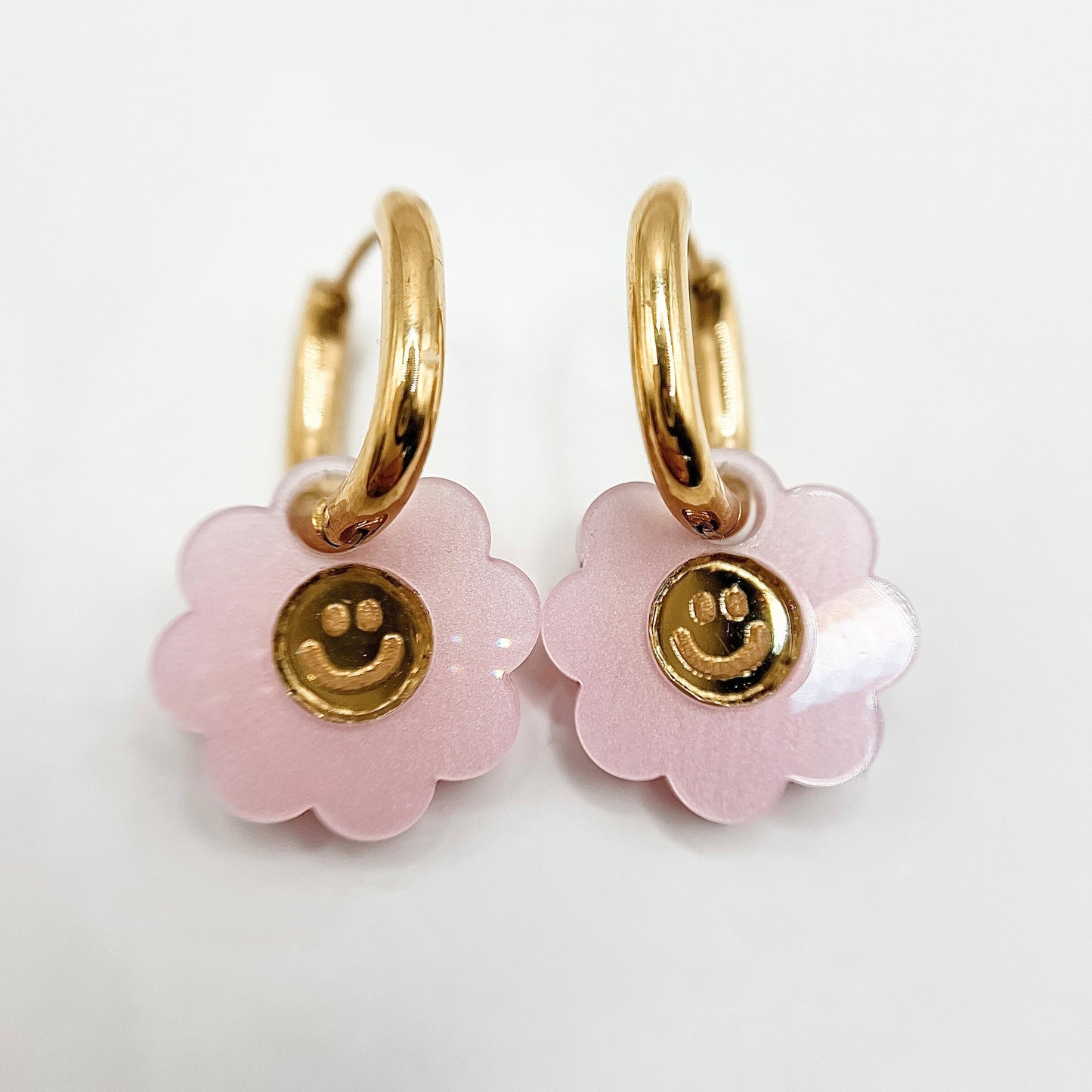 Smiley Flower Huggie Earrings from Weezy Popshop.