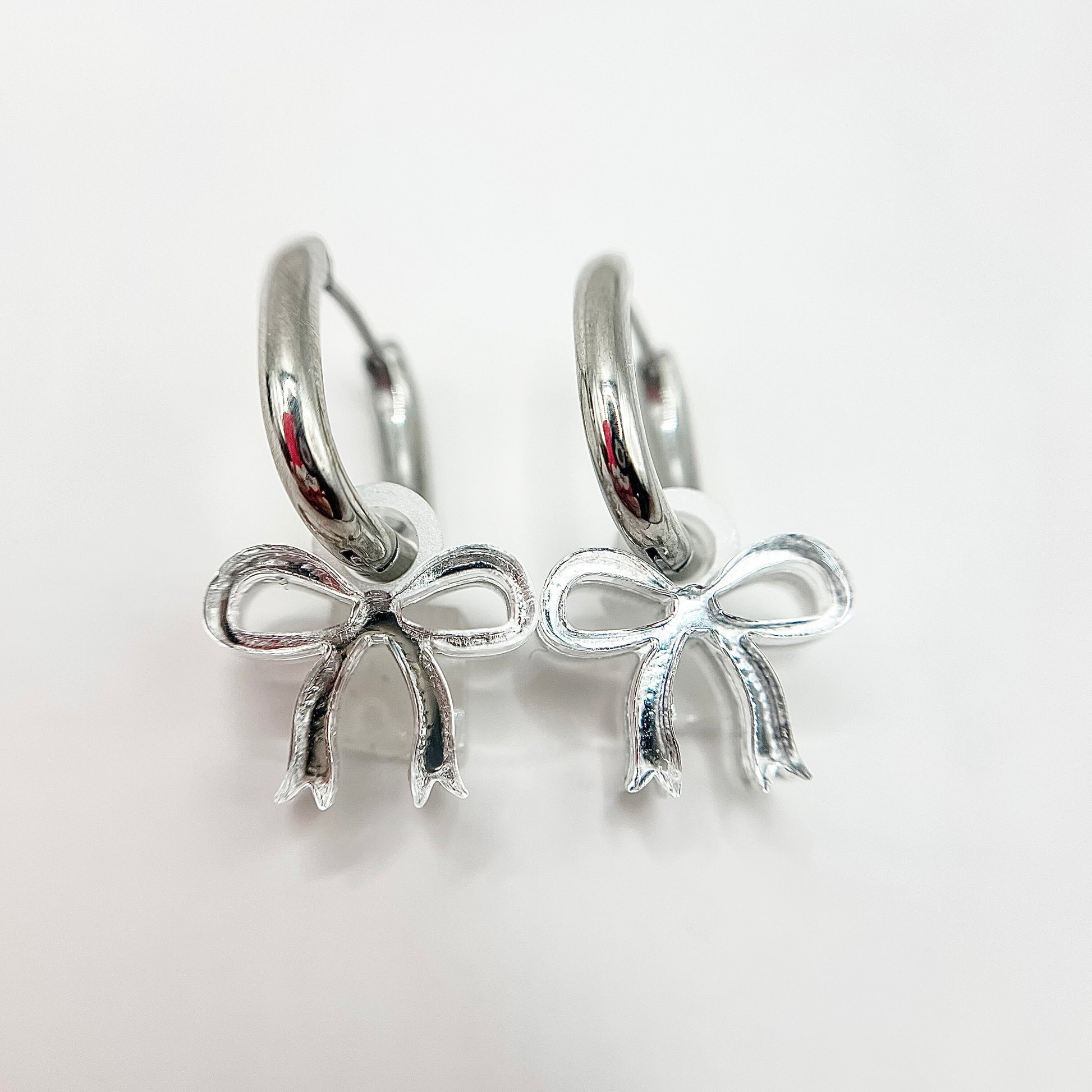 Bow Huggie Earrings – Cute, Trendy and On-Point for Bow Season from Weezy Popshop.