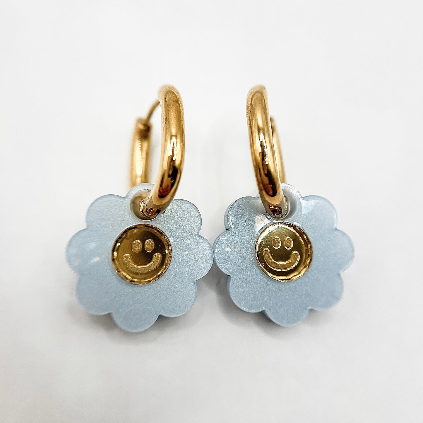 Smiley Flower Huggie Earrings from Weezy Popshop.